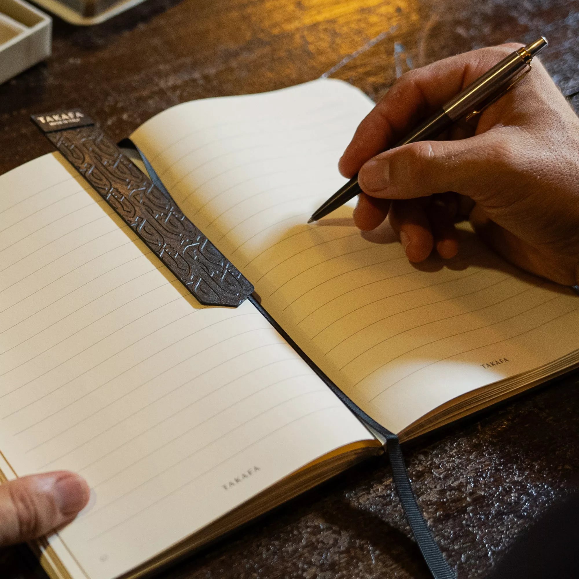 Distinguishing features of a high-end writing journal